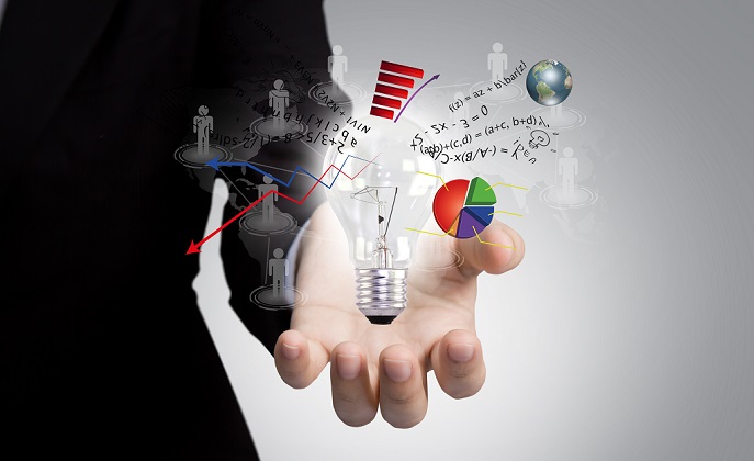 light bulb in hand with graph out